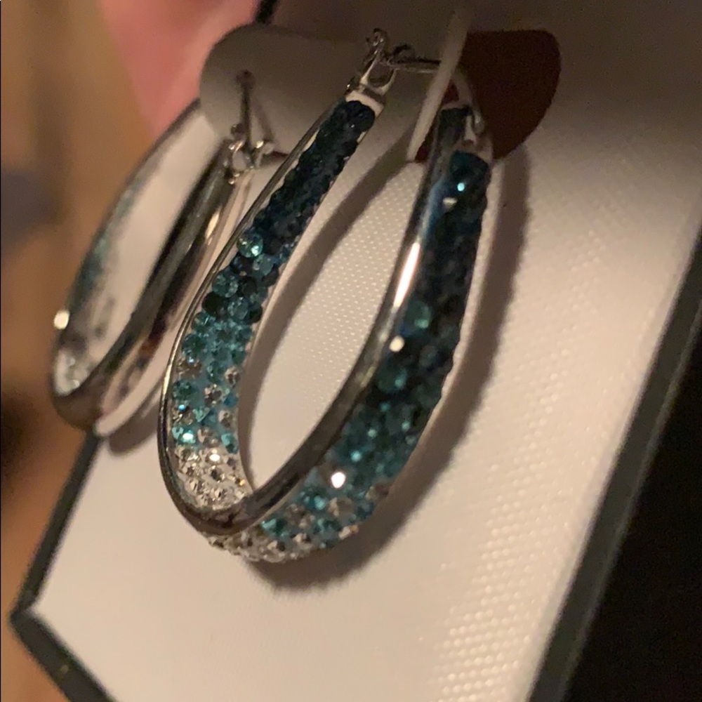 Silver hoops with blue diamonds